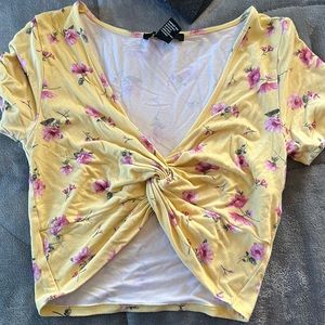 This floral crop top is forever 21 in a size small.